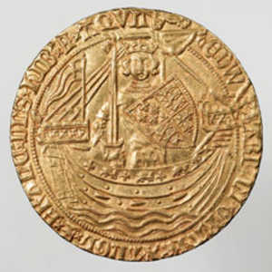 Monnaie à l’effigie d’Edouard III d’Angleterre, datant de 1344.
Elle représente le type de bateau de Bayonne. On peut distinguer
clairement sur la cogue, sa proue curviligne, différente des cogues
de la Ligue Hanséatique. –Proue curviligne.