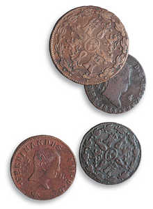 55.	Maravedi coins of Fernando VII, minted in 1833. Farmhouse rent was paid in wheat and other goods; it was only in the 19th century that money was currently used.