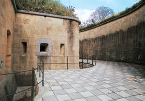 141. Exterior of one of the double caponiers in the Guadalupe Fort. Note the diamond fosse and various openings for firing shells, a machicolation, a gun emplacement for a 5.7 cm cannon and a vertical crenellation on either side. The covering of the fosse is not the same as in the original design of the fort.© Gorka Agirre